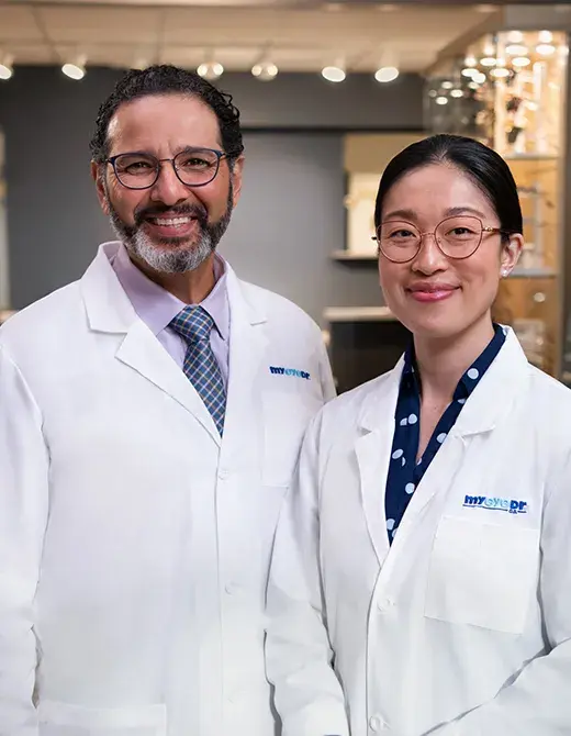 Two eye doctors smiling