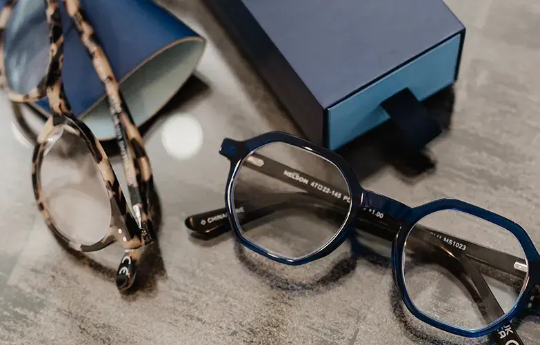 Reading glasses on desk