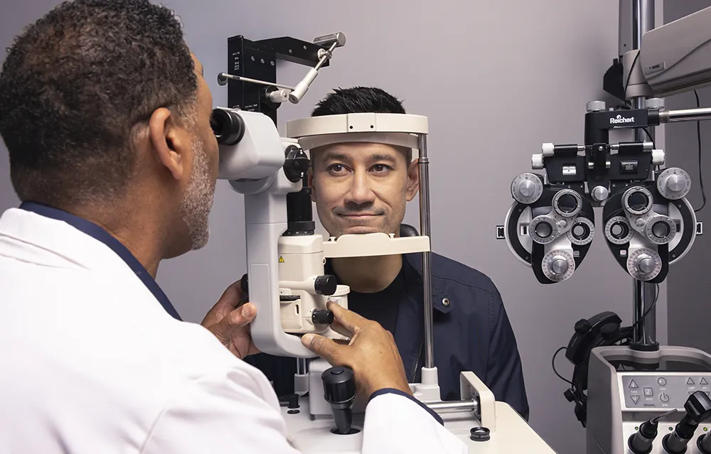 Male receiving comprehensive eye exam