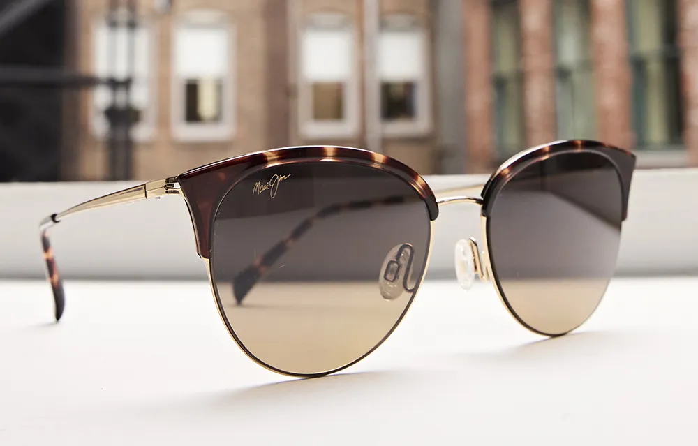 Maui Jim sunglasses resting on windowsill