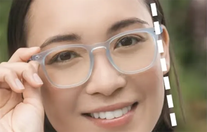 Female wearing clear frame glasses 