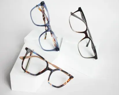 Three Alex Grant glasses frames