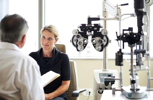Woman receiving eye exam