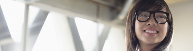 Girl smiling wearing glasses