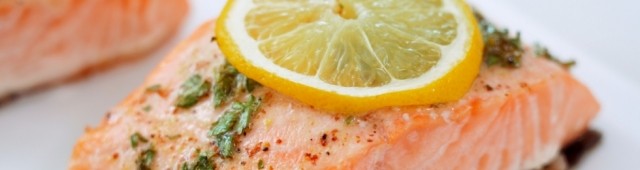 baked salmon with lemon on top