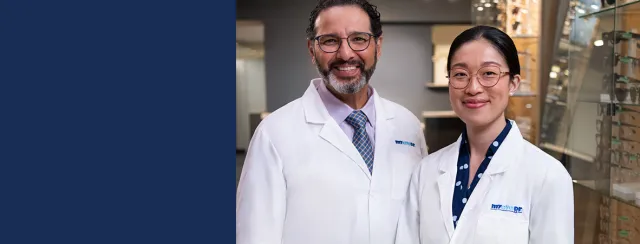 Two eye doctors smiling