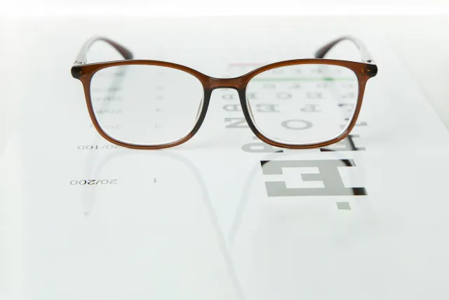 Close up view of a eyeglasses with brown frame