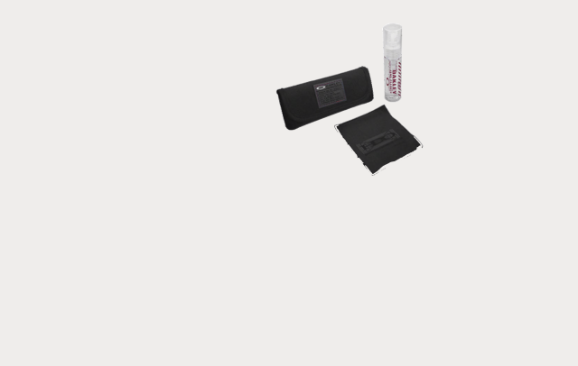 A glasses cleaning kit including a black case, a cleaning spray bottle, and a microfiber cloth, arranged on a white background.